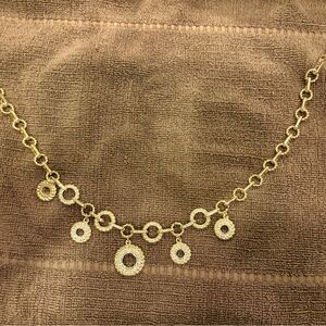 Jones NY fun necklace. Hollow circles each surrounded by sparkly stones.